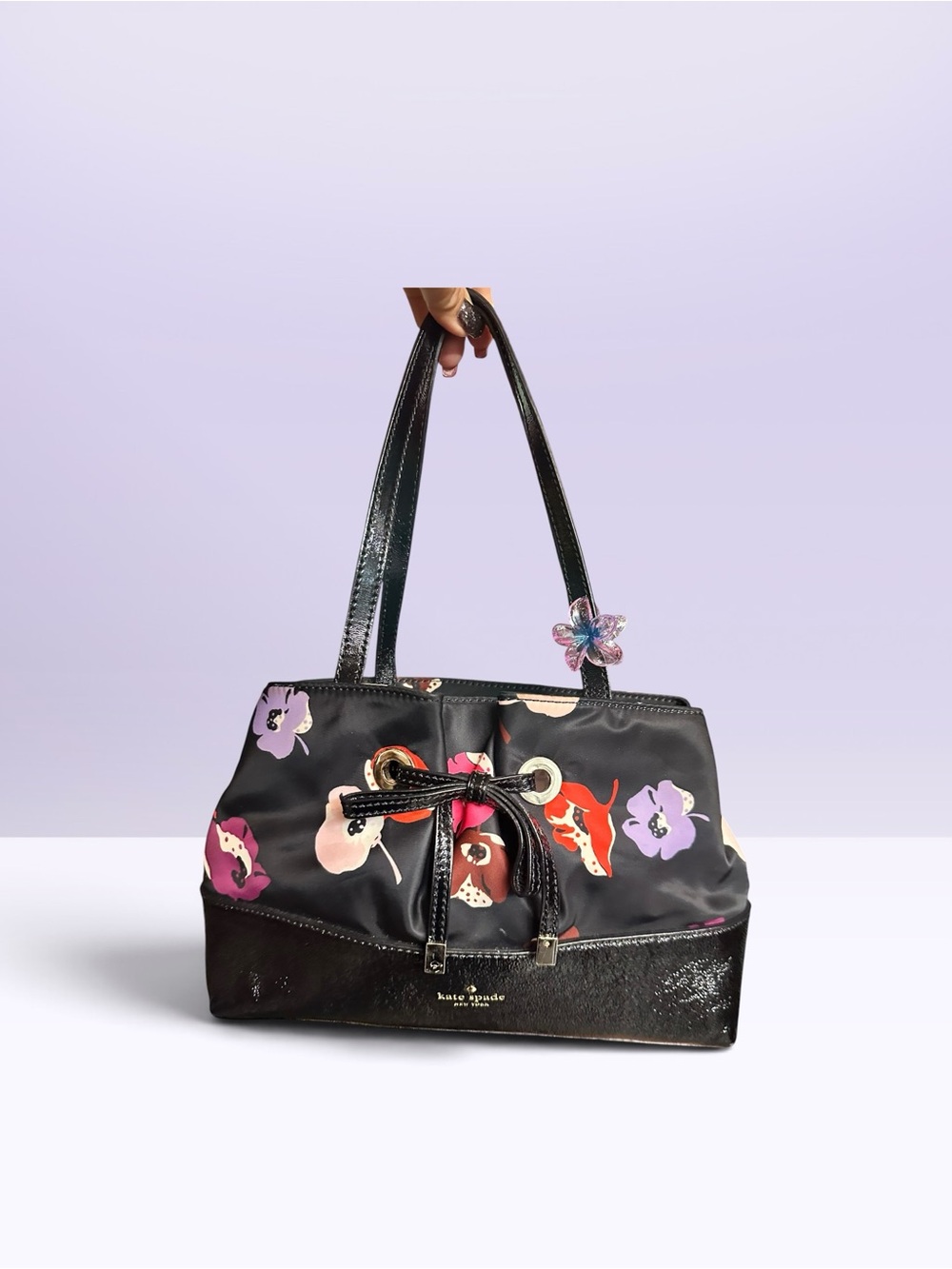 kate spade Black Floral Drawstring Shoulder Bag with Pink & Purple Accents